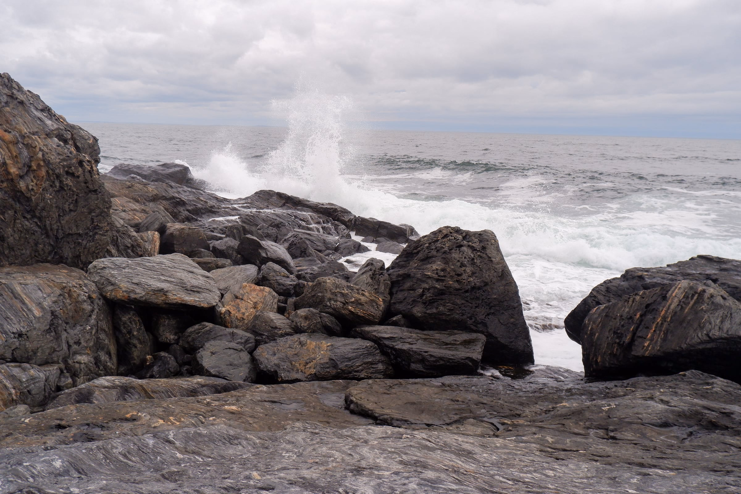 Wave crashing in at Cobblestone cove on the Southeastern side of the island.
